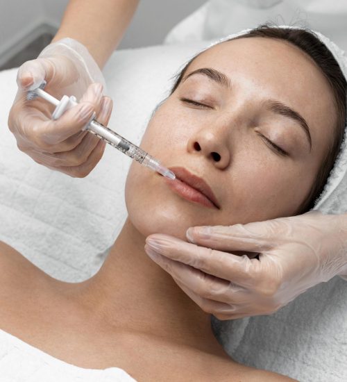 beautician-doing-injection-filler-female-client